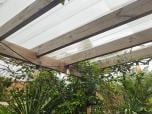 Transparentes Vordach mit ONDULINE PC Lichtplatte aus Polycarbonat in Trapezform